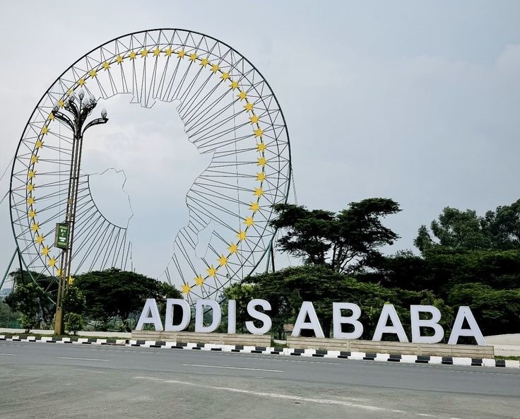 The Addis Ababa monument, featuring the African Union's continent emblem in a starred wheel above the city's name